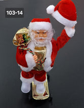 Moș Crăciun pe skateboard cu baterii, decor - 25cm